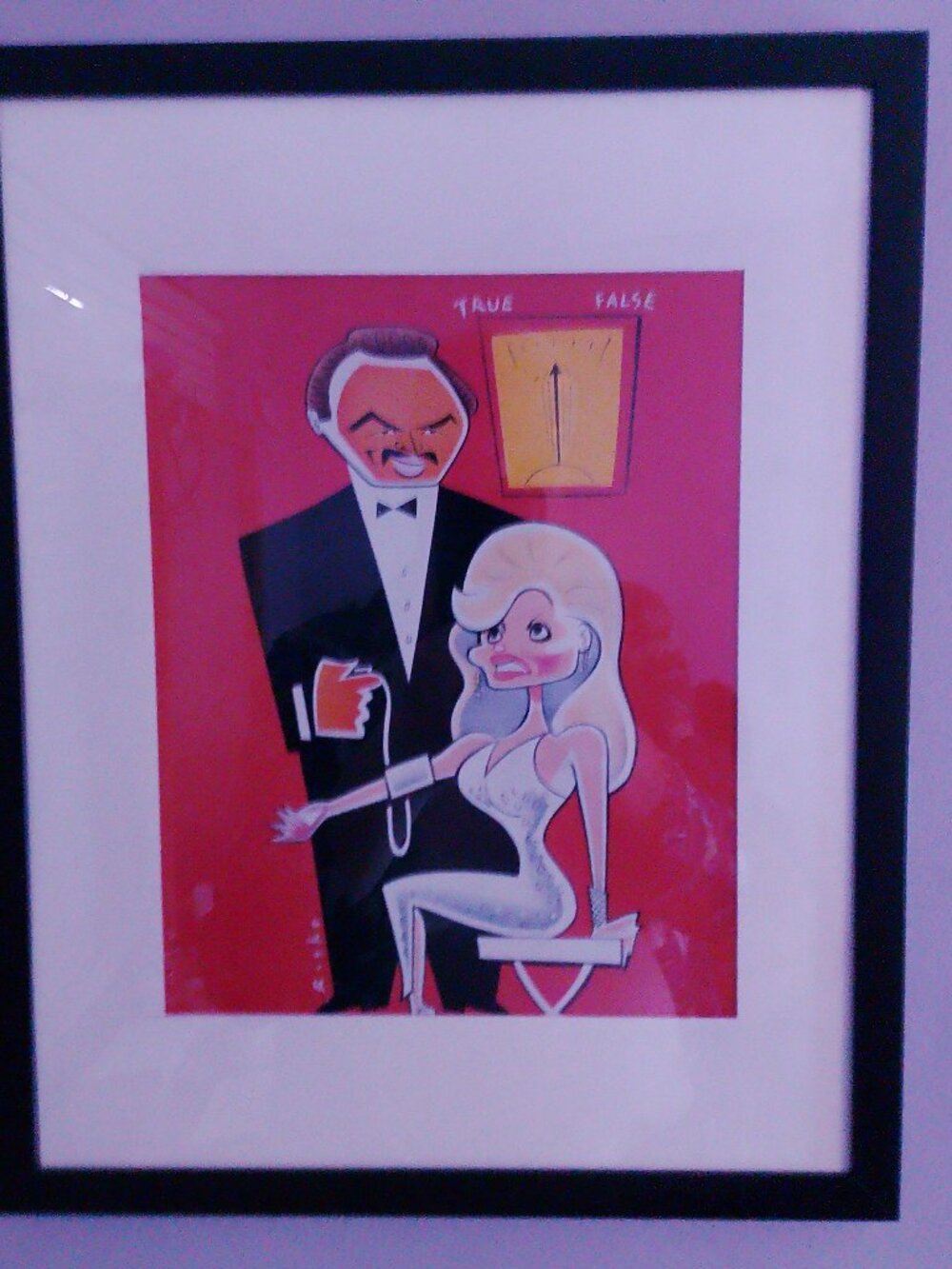14"x12" caricature of Burt Reynolds and Loni Anderson by Risko